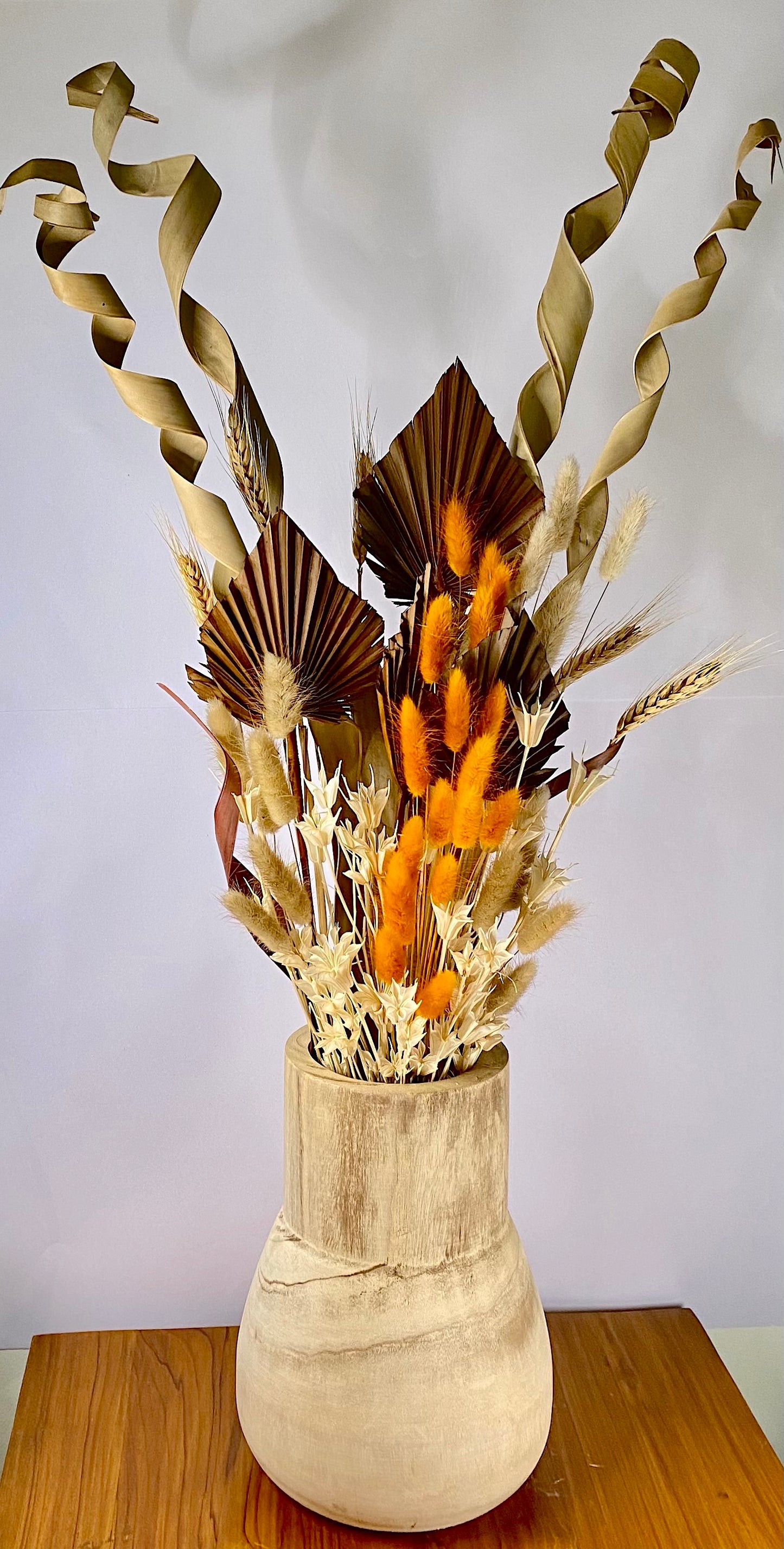 Flower Arrangement in Wooden Pot